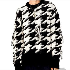 Limited edition fringed jacquard sweater.